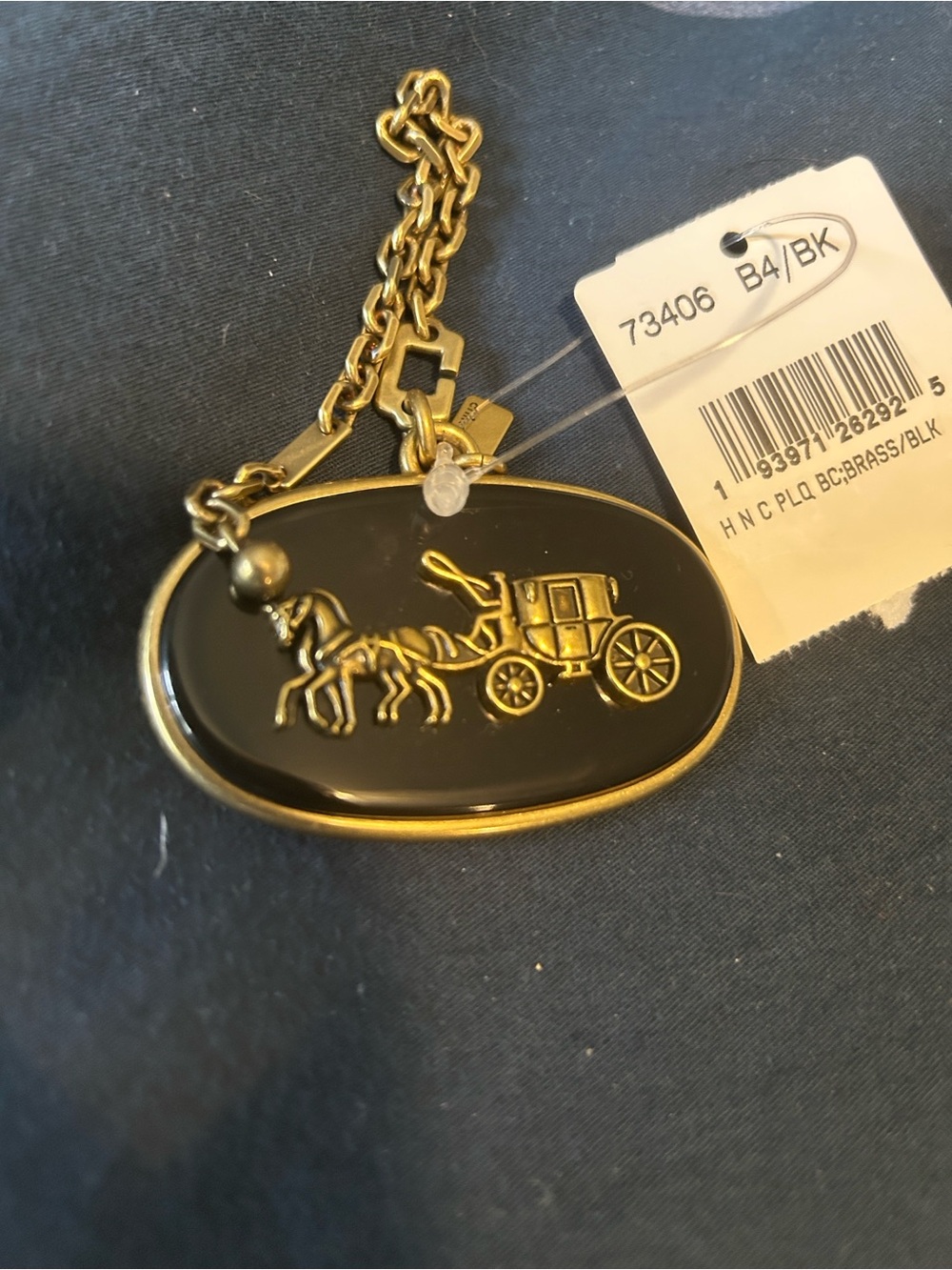 Coach Black and Gold Horse & Carriage Oval Charm